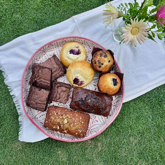 A Broke Baker Eid gift box with assorted sweet and savory treats. Bakery in Lahore. 
Eid dessert box packaging Pakistan
brownies,  muffins, banana bread, tea cakes.  Eid gift box