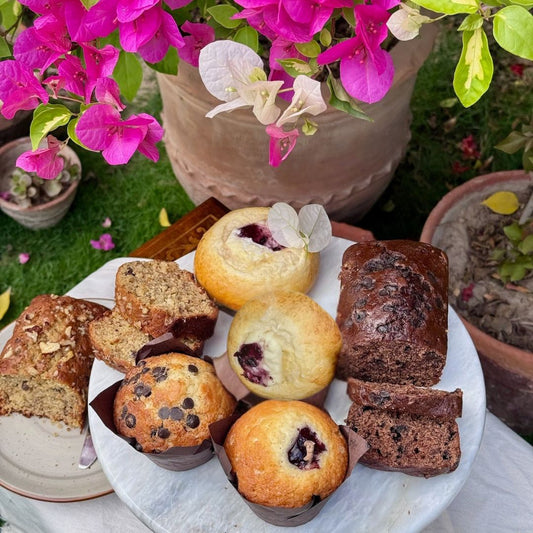 A Broke Baker Eid gift box with assorted sweet and savory treats. Bakery in Lahore. 
Eid dessert box packaging Pakistan
brownies,  muffins, banana bread, tea cakes.  Eid gift box
